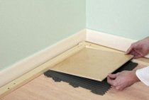 Comment carreler un parquet en bois dans une salle de bain