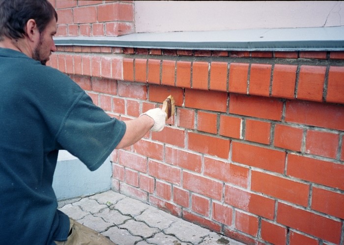 Comment nettoyer la cheminée dans le poêle d'une maison privée